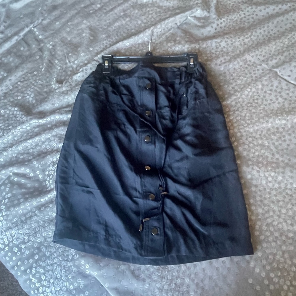 Black skirt with buttons and draw-string. New.